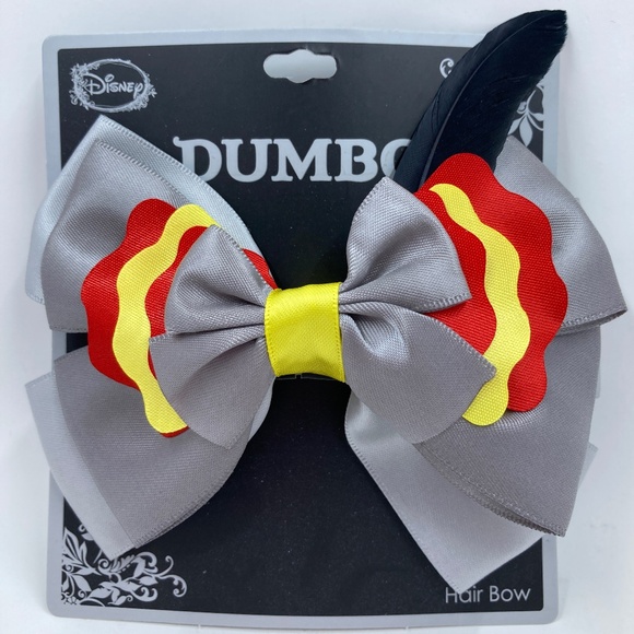 Disney Accessories - Disney Dumbo Hair Bow With Feather NEVER USED Original Packaging Aligator Clip